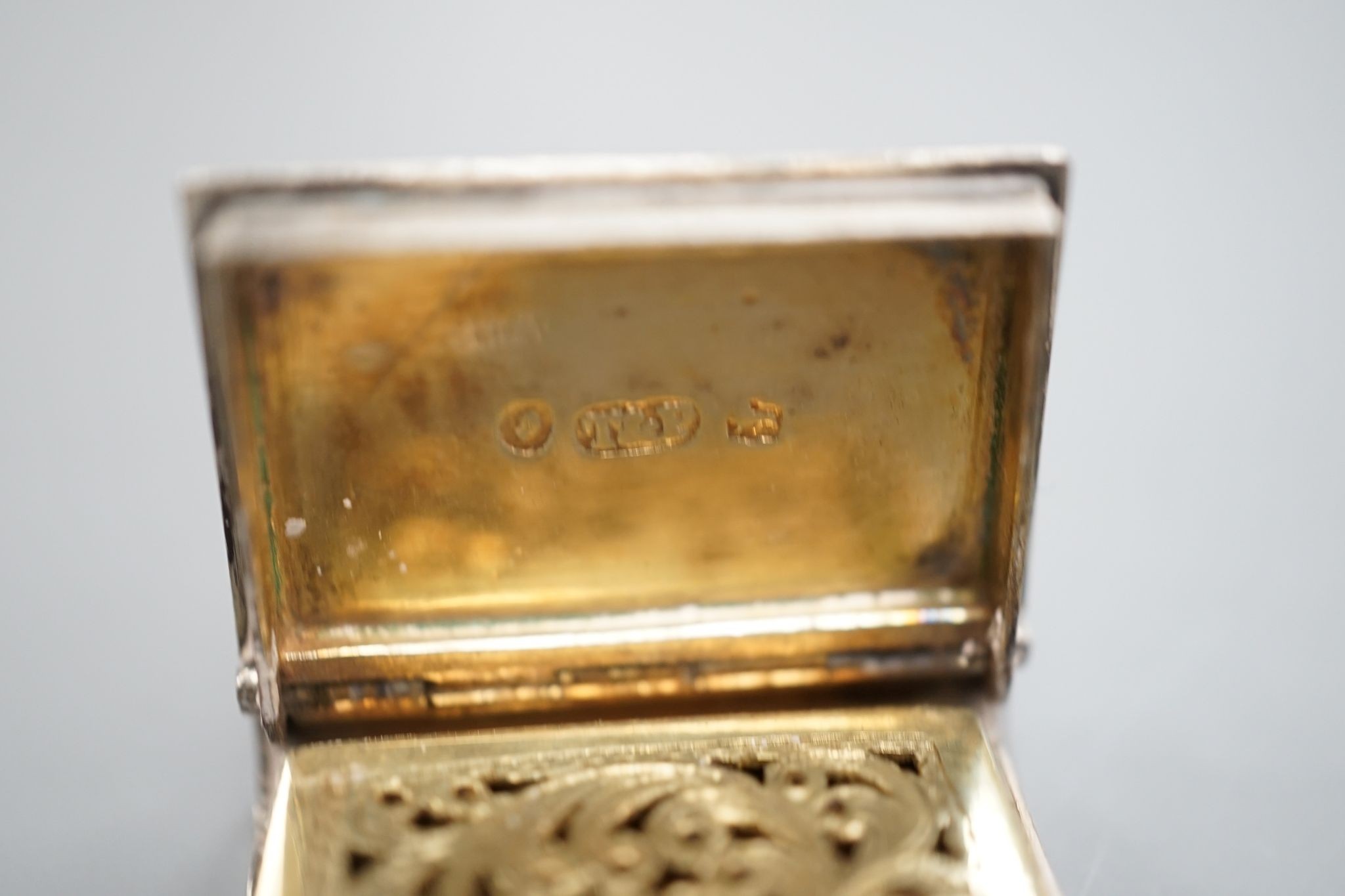 An early Victorian novelty silver vinaigrette, modelled as a book, Taylor & Perry, Birmingham, 1838, 26mm.